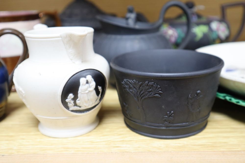 A group of 19th century Wedgwood etc. basalt wares, copper lustre and other British pottery